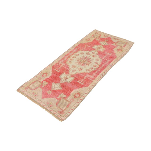 Vintage Handknotted decorative mini rug from Kars region of Turkey. Approximately 45-55 years old. In very good condition.