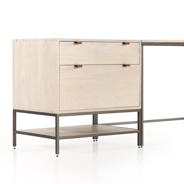 Inspired by clean midcentury design, a modular desk of light-washed solid poplar offers plenty of storage by way of three...