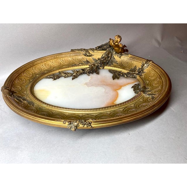This exceptional 19th-century French decorative server combines richly aged bronze, luminous natural alabaster and finely...