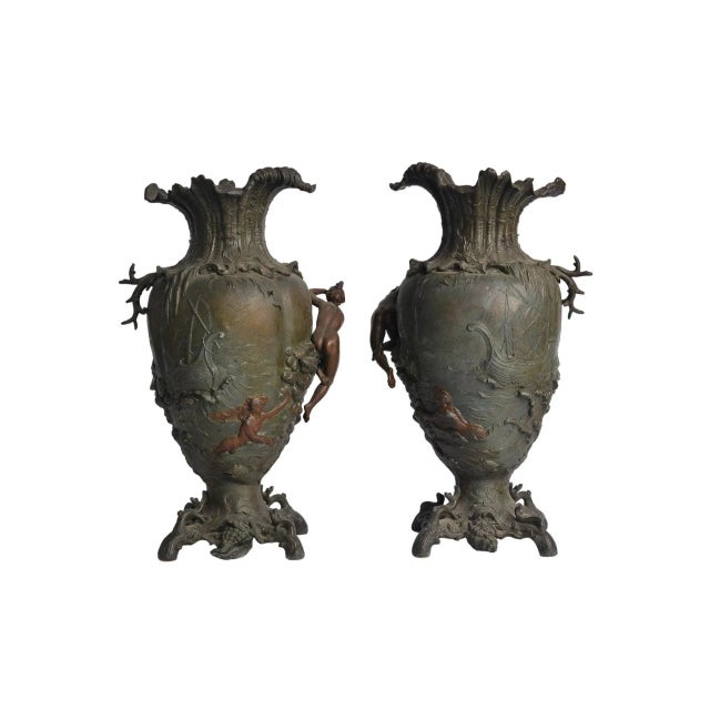 Elevate your decor with our Antique French Bronze Nude Female Vessel Ship Planter Vase Urns, epitomizing classical beauty....
