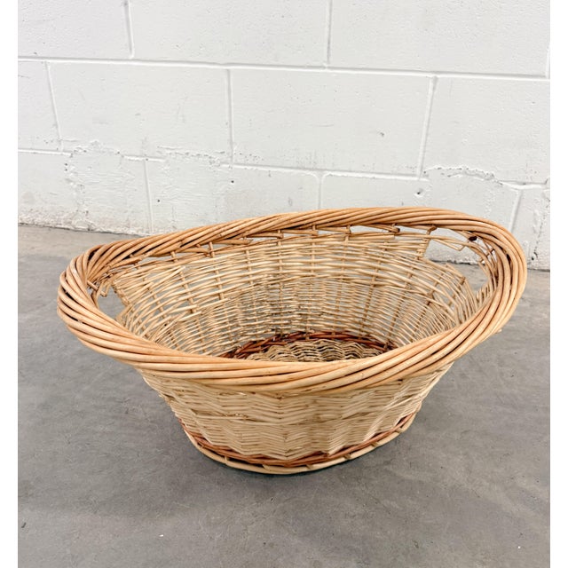 These exquisite, authentic vintage oval-shaped baskets feature a warm beige base adorned with a sienna stripe accent and a...