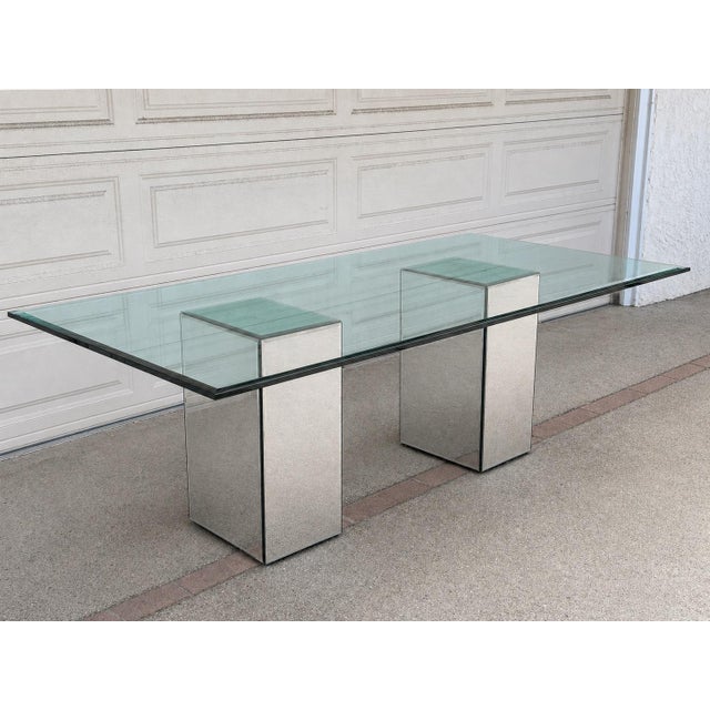 Striking 1980s Postmodern dining table in the style of Karl Springer, featuring a substantial 1/2 inch thick beveled glass...