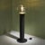The Aella Floor Lamp, designed by Renato Toso and Giovanna Noti Massari for Leucos in 1968, features a black matte stee;...