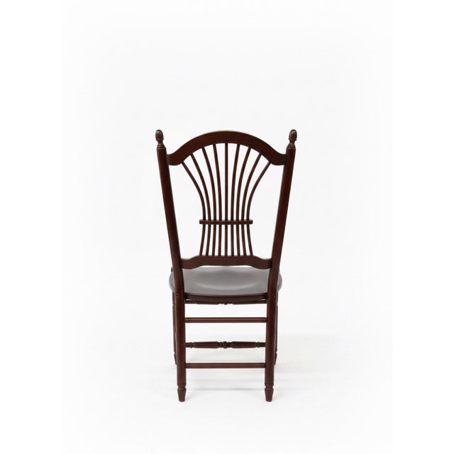 Classic solid cherry dining side chair by Tom Seely Furniture, reflecting the company’s tradition of finely crafted...