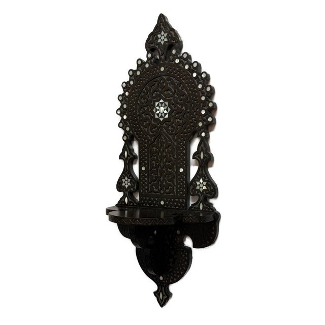 Handmade Wooden Wall Shelf with Mother-of-Pearl Inlay Bring timeless Middle Eastern craftsmanship into your home with this...