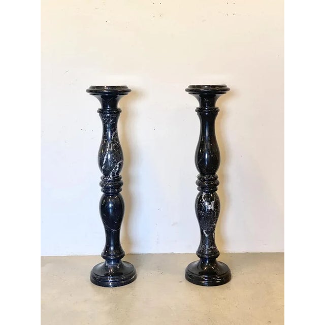 Pair of 60s columns in Marquinia black marble.