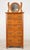 Vintage quarter sawn oak tall dresser with five dovetailed drawers and a beveled glass mirror. The curved mirror supports...