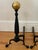 Beautiful American midcentury cast iron andirons with brass cannonball toppers. Heavy and solid. No maker's mark. Please...