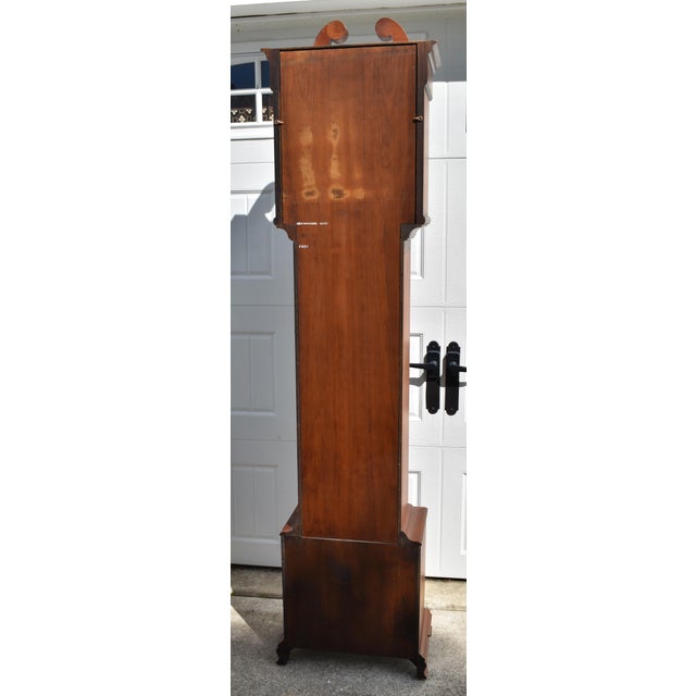 Vintage (1977) Grandfathers Clock has a Traditional Style. Made of Solid Cherry. Weights, Pendulum, Chimes. The...