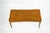 Elegant Italian Mid-Century coffee table from the 1950s, crafted in solid wood with a warm honey-toned finish. The...