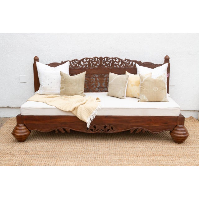 Channeling the relaxed grandeur of an ancient Balinese Royal Pavilion, this daybed is more than furniture—it is an escape....