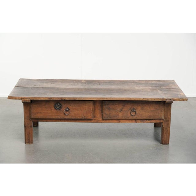 Antique Southern European fruitwood coffee table with a drawer and a beautiful, characterful patina. : This antique...