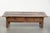 Antique Southern European fruitwood coffee table with a drawer and a beautiful, characterful patina. : This antique...