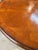 Vintage Empire style round mahogany pedestal dining table, carved center column, and ornate scrolled legs with paw feet...