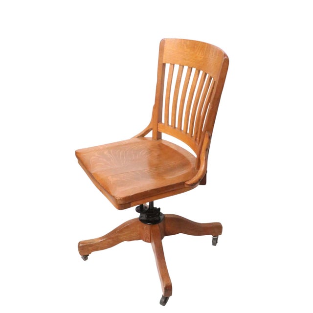 Classic Turn of The Century vintage desk chair by the Sikes Company , circa 1920/40's. The chair is constructed of solid...