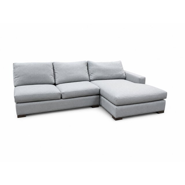 Design Plus Gallery presents the Metro Right-Arm Chaise Sectional from Room & Board. The two-piece design joins a three-...