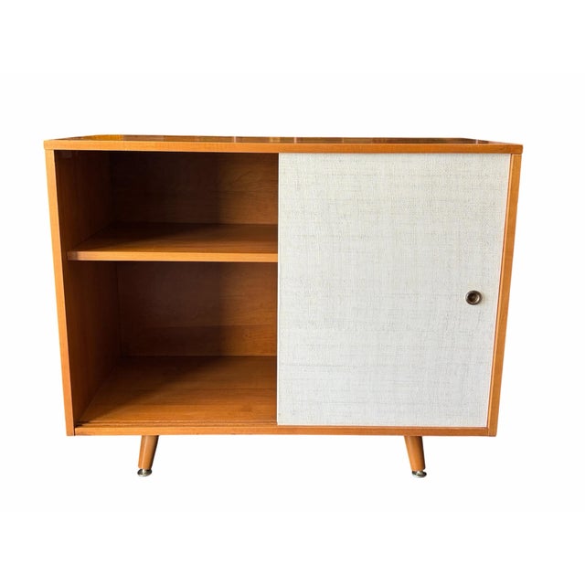 This gorgeous Mid-Century Modern cabinet perfectly captures the warmth of organic modernism, blending clean geometric...