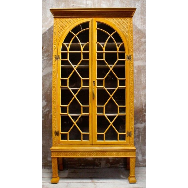 Regency Ochre Astragal Glazed Display Cabinet, circa 1820 Material: Pine, Glass, Brass An elegant English Regency display...
