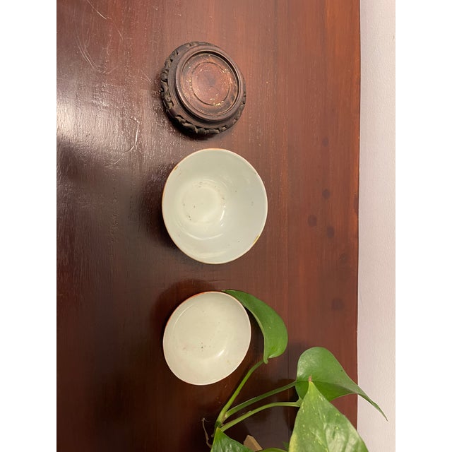 This is an exceptional example of late 19th-century Chinese porcelain art, presented as a complete three-piece set (the...