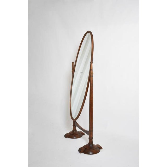 Arts and Crafts wooden psyche mirror, 1900s. Arts and Crafts movement cheval mirror in varnished wood with a swiveling...