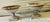 Early 20th Century Large Pair Antique White & Rust Neoclassical Iron Garden Planters Early 20th Century For Sale - Image 5 of 10