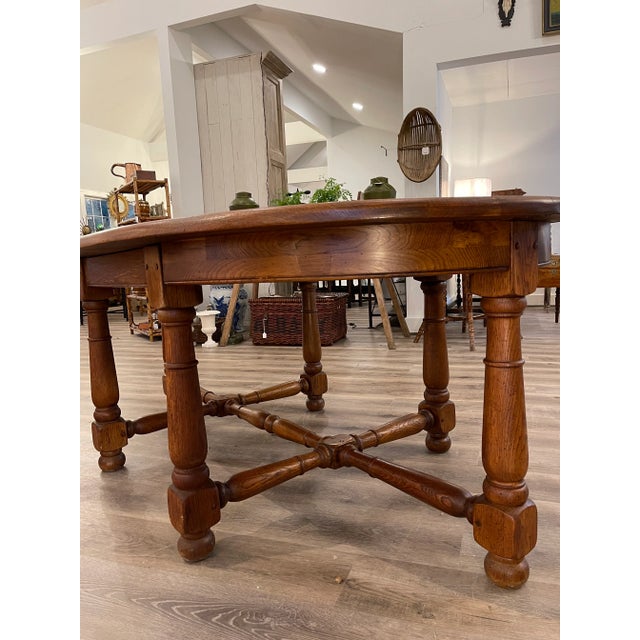 This is a gorgeous antique French dining table! The oval shape of this piece is very unique, as it is not a common design...