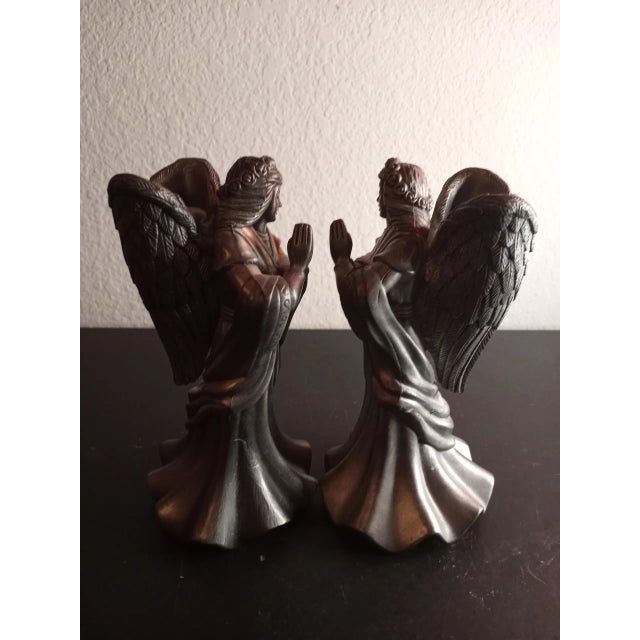 These are Solid Bronze 7" Candle Holder Angel Figurines Set of 2. Procured at auction BOX 16