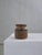 Mid-century stoneware pot designed by Otto Klaesson for Höganäs, Sweden. Crafted in earthy brown glaze with decorative...