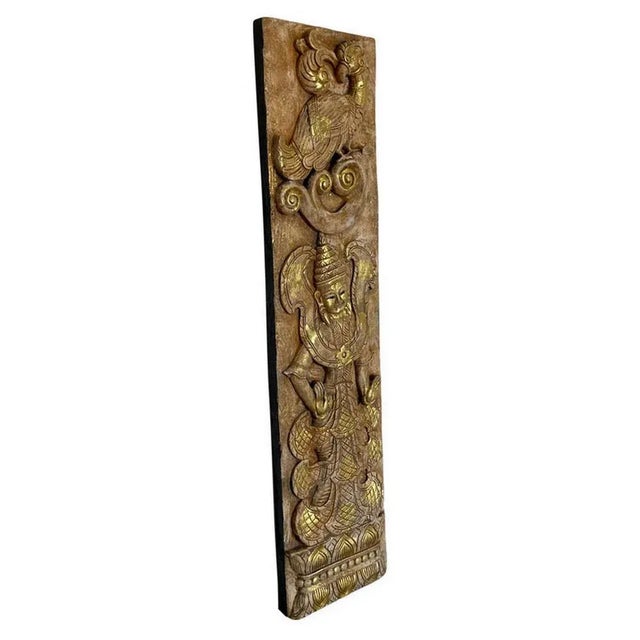 This decorative panel has been painstakingly hand carved by master carvers of Thailand from a single piece wood. The...