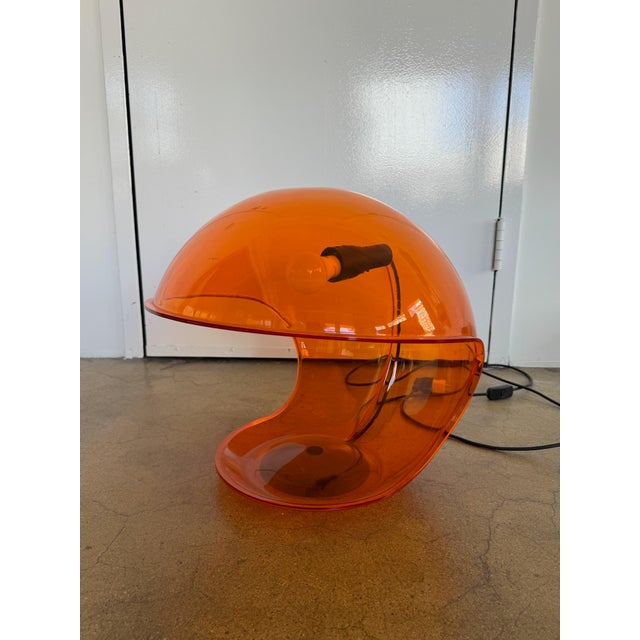 Rare 1960s Elio Martinelli Foglia table lamp in translucent orange. In good vintage condition consistent with age and use.