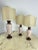 Set of 3 Mid-Century Italian wood and ceramic table lamps from the 1960s. Intact and in good condition. The large one is...