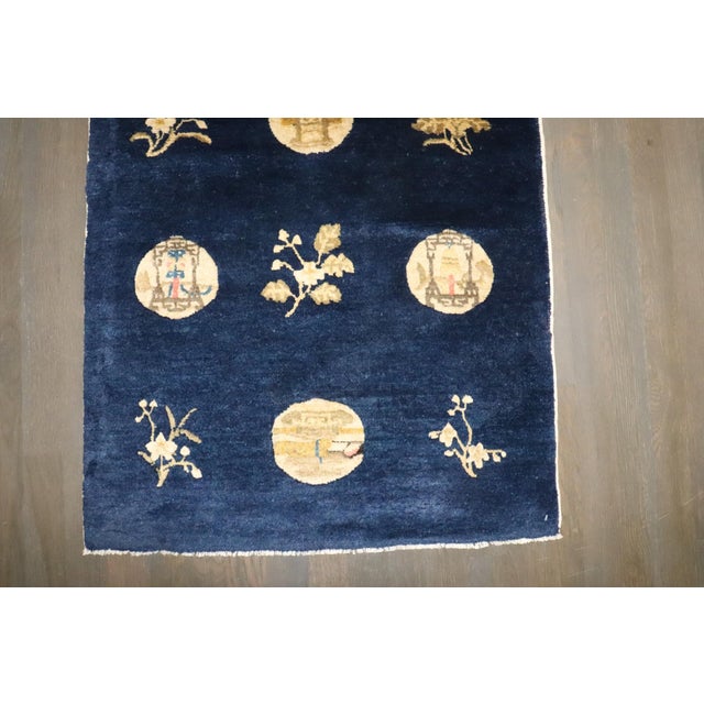 An early 20th Century Chinese Peking Small Rug