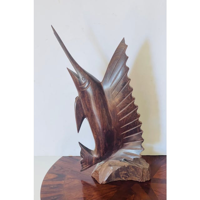 Handcarved hard tropical wood sculpture of a marlin. Found sh.