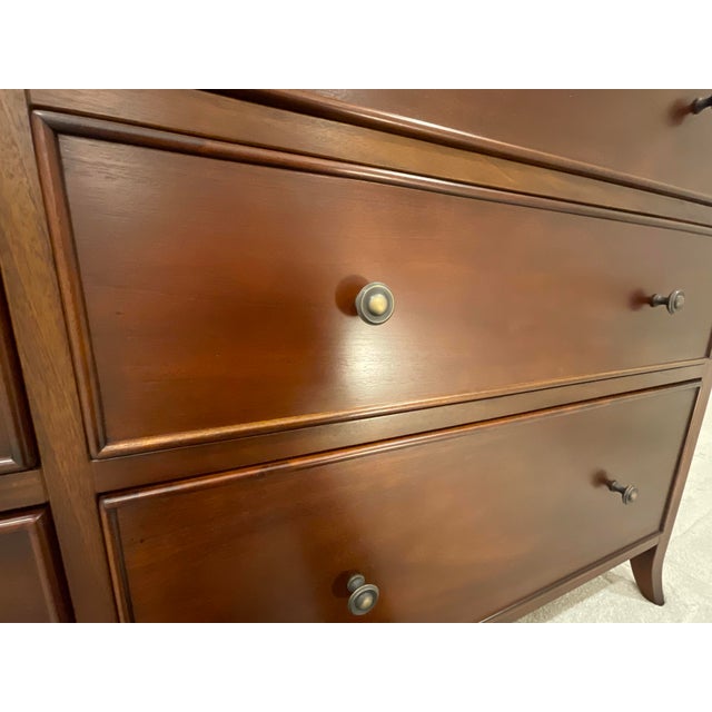 This Arhaus 'Keiran' dresser is both gorgeous and functional! Constructed with solid mahogany face frames. To showcase the...