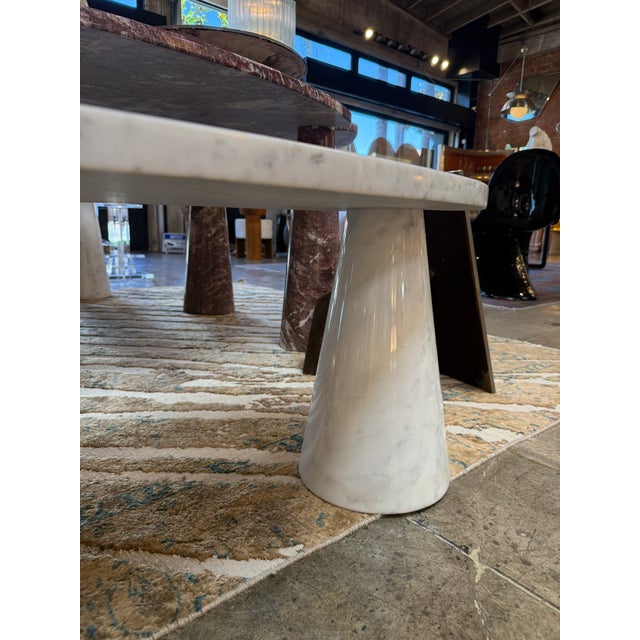 Angelo Mangiarotti coffee table from the iconic Eros series, crafted in white marble with an elongated sculptural top...