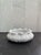 Hand-carved from solid Indian white marble, this sculptural 12 x 12 x 5 inch bowl features a beautifully fluted, petal-...