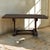 Handcrafted from solid oak, this authentic 19th century rustic coffee table possesses the honest character and enduring...