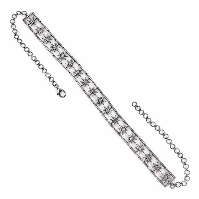 This is a beauitful Victorian style choker necklace, it is crafted in darkened sterling silver with a smooth polished...