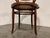 Dark brown bentwood dining armchair or bistro chair with original webbing We date it at early 1950s. Good condition with...