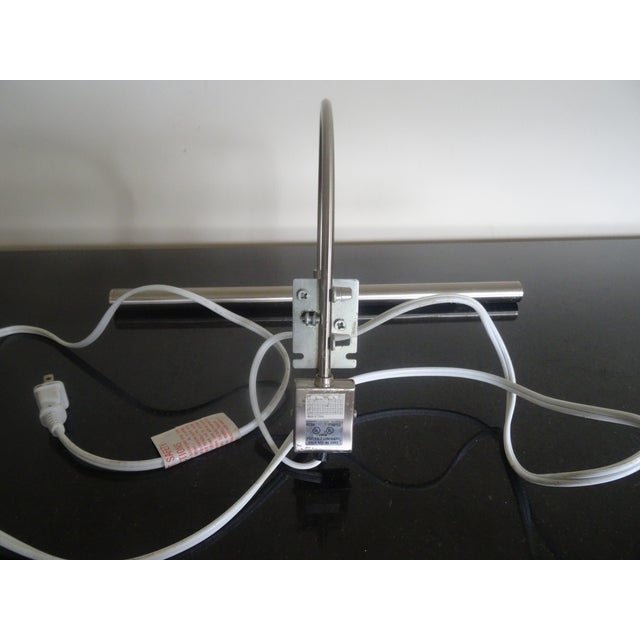 House of Troy Advent 16" wide picture lights. Satin Nickel, most are new and unopened in original packaging. Purchased for...