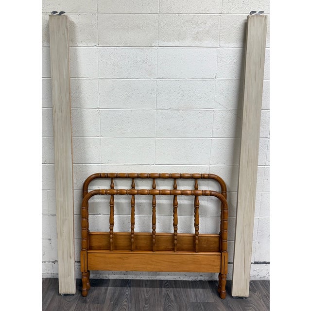 This is an absolutely stunning vintage wood twin sized Jenny Lind bed. This bed is very solid and sturdy, and includes the...