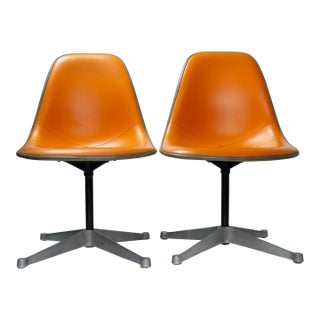 From the United Nations! Matching Set of 1972 Eames PSCC Side Chairs in Original Orange Naugahyde For Sale