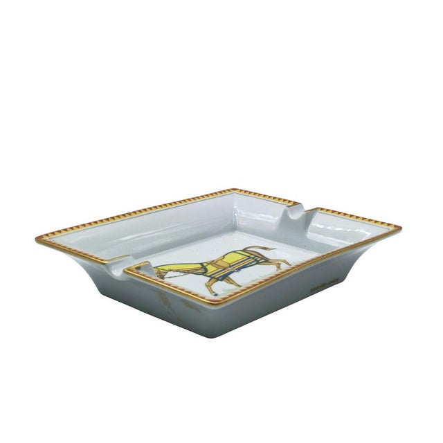 A stunning and iconic rectangular ashtray (which can also be used as an elegant trinket dish) by Hermès Paris, crafted...