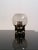 Beautiful table lamp by Sussmuth Leuchten. Germany, 1970s. All smoked clear glass, tripod base. The lamp holder is chrome-...