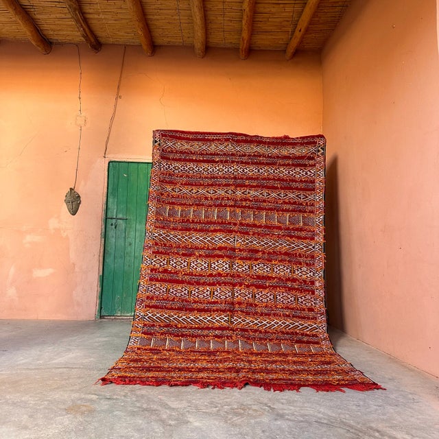 This vintage Moroccan rug is a true powerful women's artistic creation that is the first thing our eyes get caught when we...