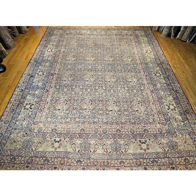 Magnificent Late 19th Century Persian Kerman Lavar Oversize (Mansion Size) Rug. Meticulously hand-knotted, this piece is a...