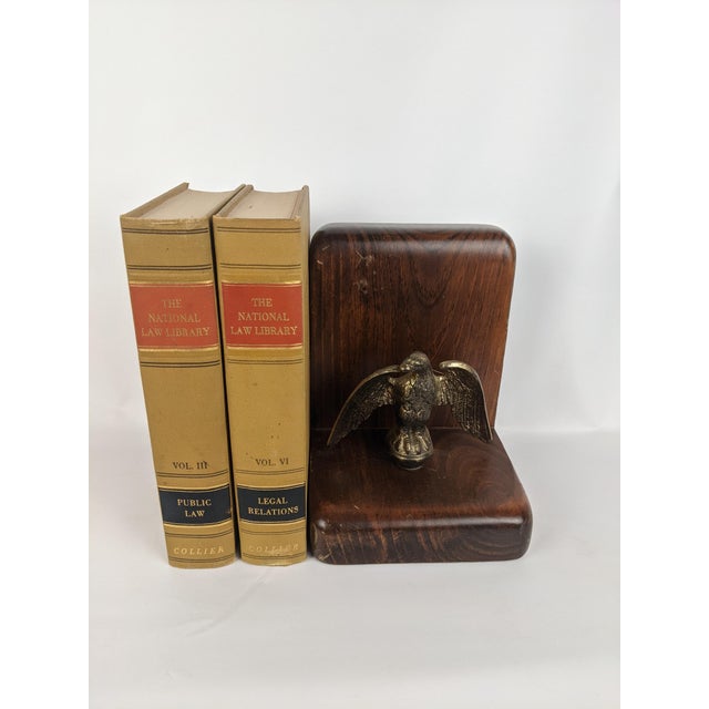 A distinctive pair of vintage volumes from The National Law Library, published in 1939 by P. F. Collier & Son Corporation,...