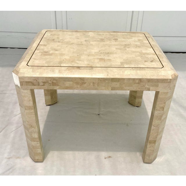 Here is a gorgeous stone and brass side table attributed to Maitland-Smith, dating to the 1980's. The table features a...