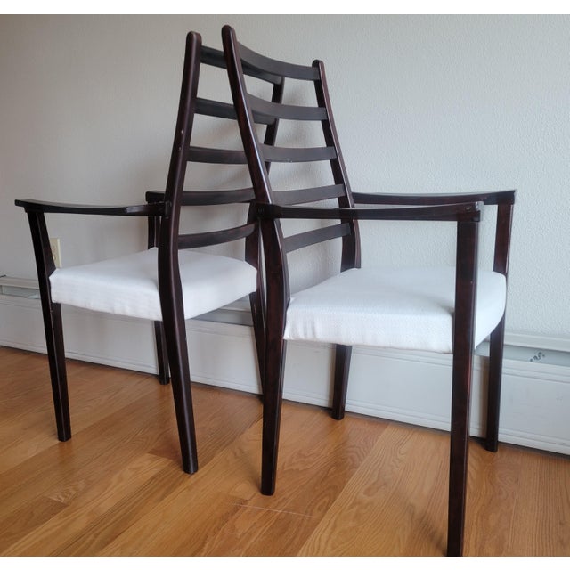 A beautiful set of 6 Scandinavian Modern Ladderback Dining Chairs by Svegards Markaryd of Sweden. Four (4) side chairs and...