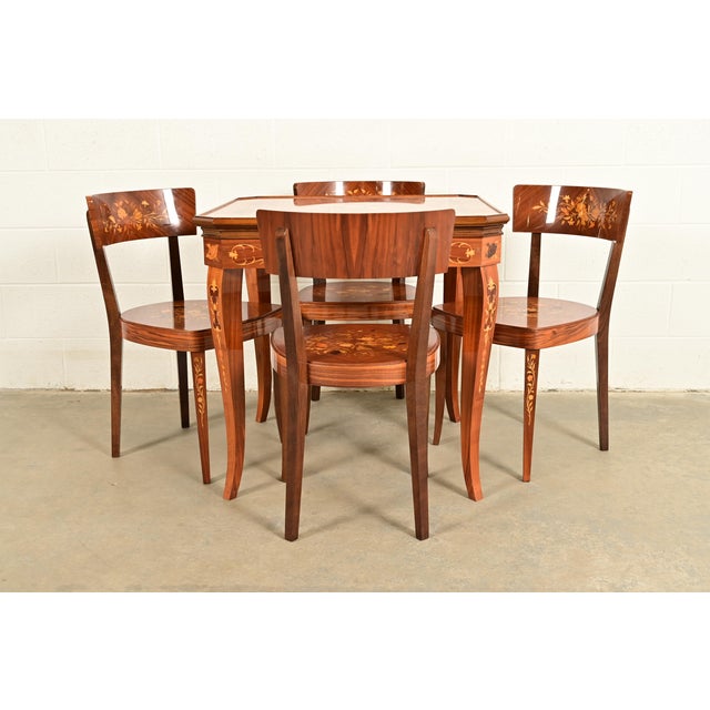 An outstanding Italian Louis XVI style flip top game table with four chairs Italy, Circa Early 20th Century Gorgeous...